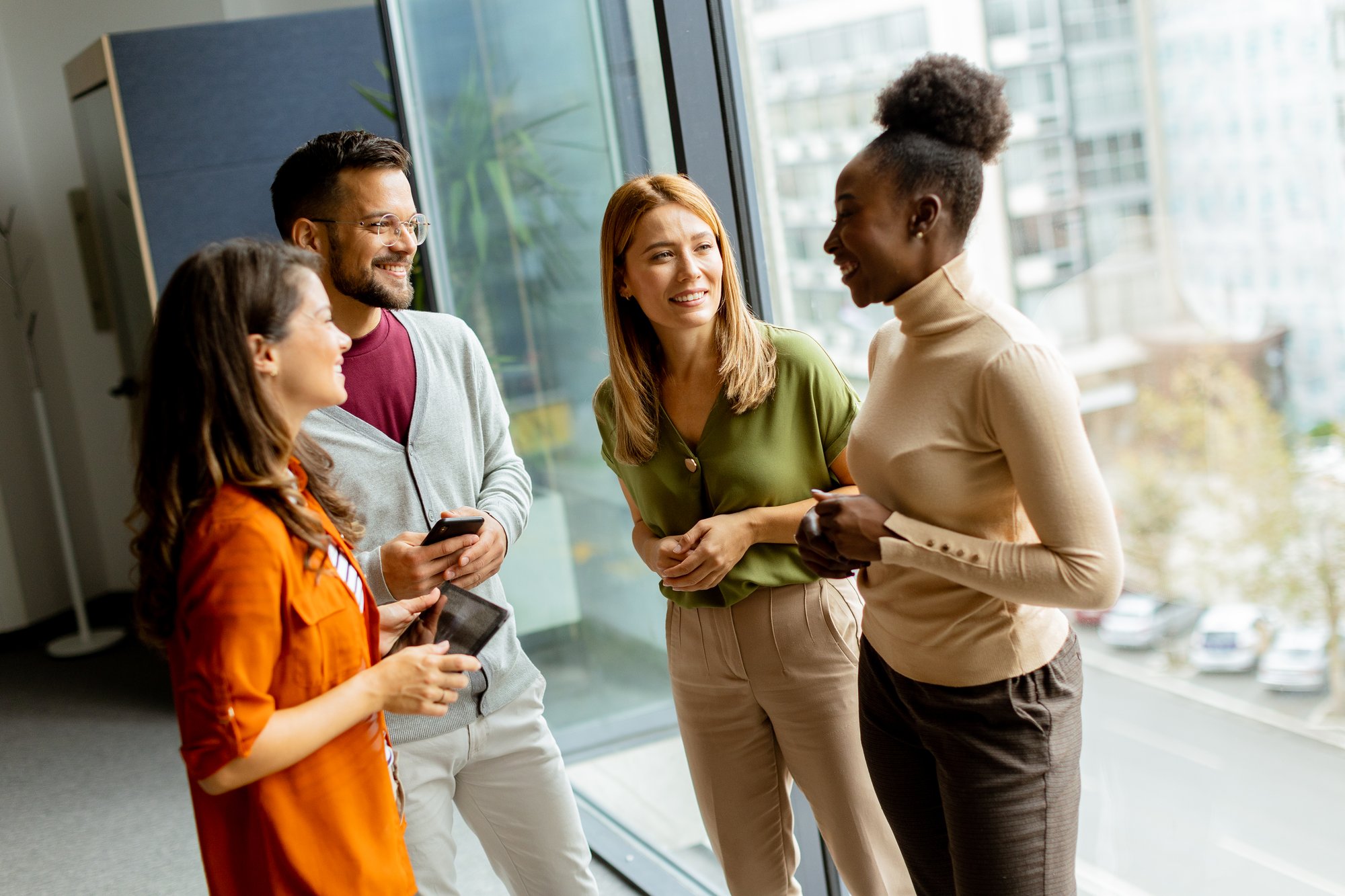 young-multiethnic-startup-team-working-modern-office